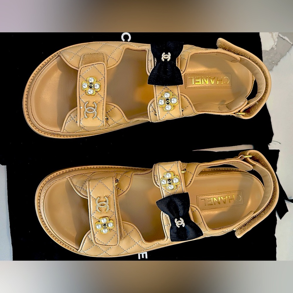 Chanel Gate NO 5 lambskin Velcro dad sandals. Black bow and Chanel ornaments.